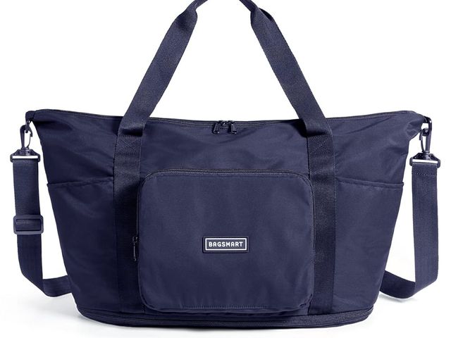 A navy blue Bagsmart foldable travel bag.