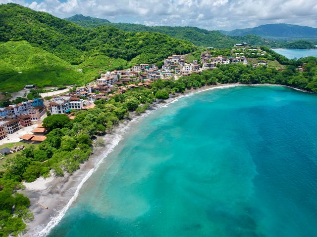 An aerial view of the scenic coastline and beach in Las Catalinas, Costa Rica.