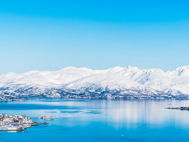 View from Mount Storsteinen on the Norwegian mountains around the city of Tromso.