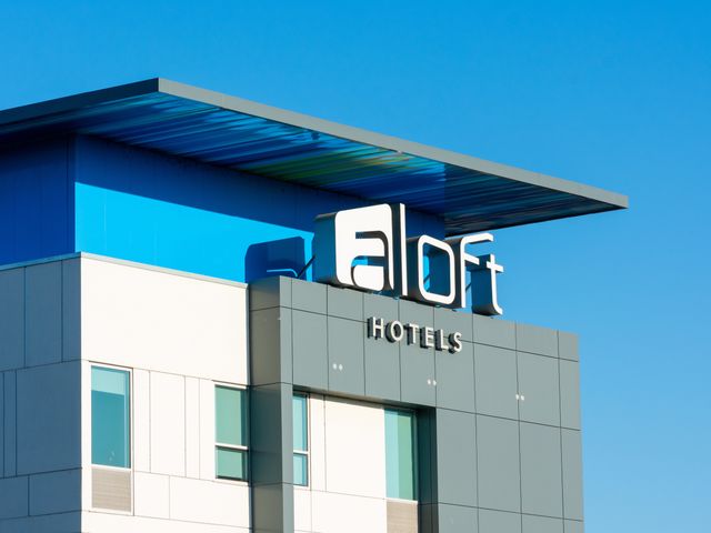 Aloft Hotels sign on the contemporary hotel building.