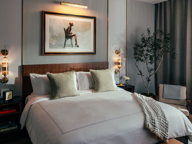 A King room at The Global Ambassador in Phoenix.
