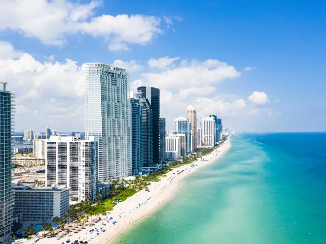 A view of the Miami beach skyline facing the ocean.