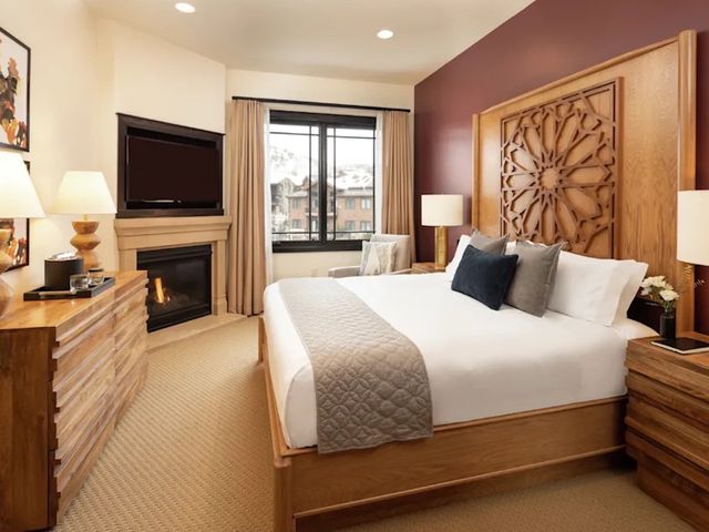 Interior of hotel room decorated in warm tones