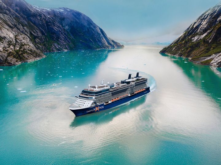The Celebrity Solstice sailing down an Alaska passage.