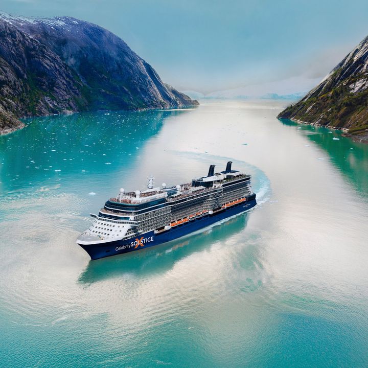 The Celebrity Solstice sailing down an Alaska passage.